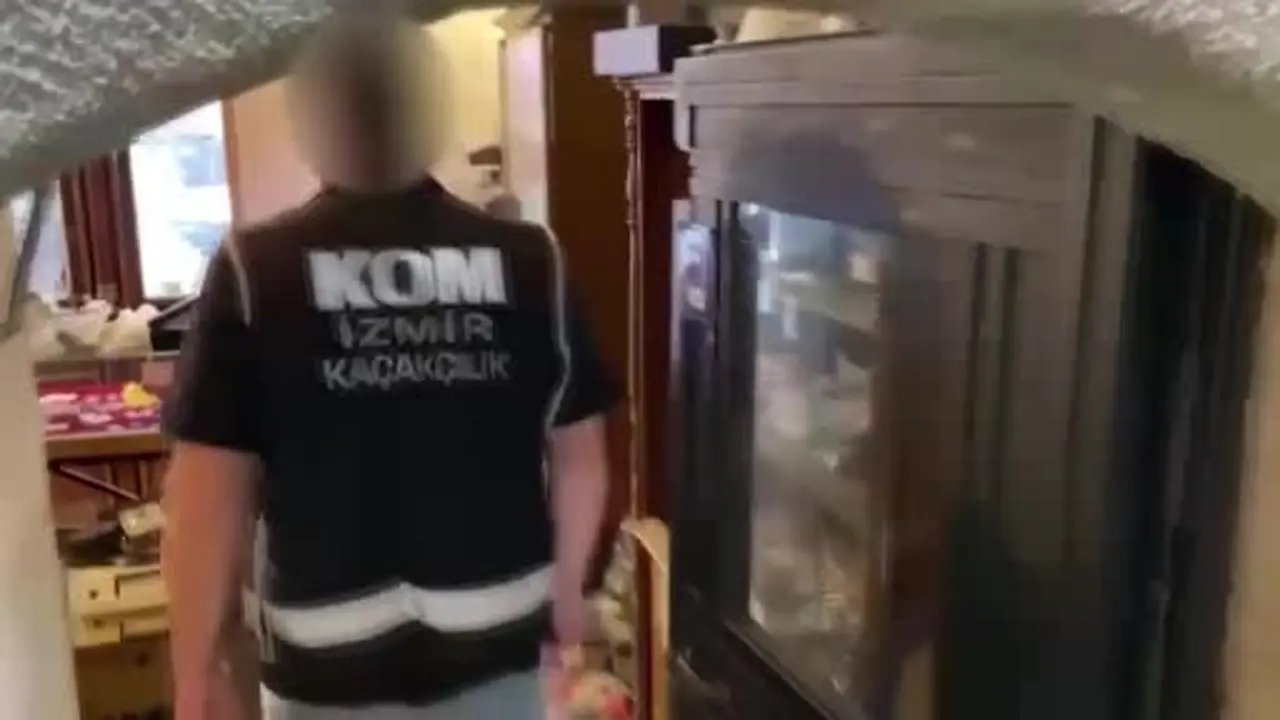 İş yerinde yüzlerce sikke ele geçirildi