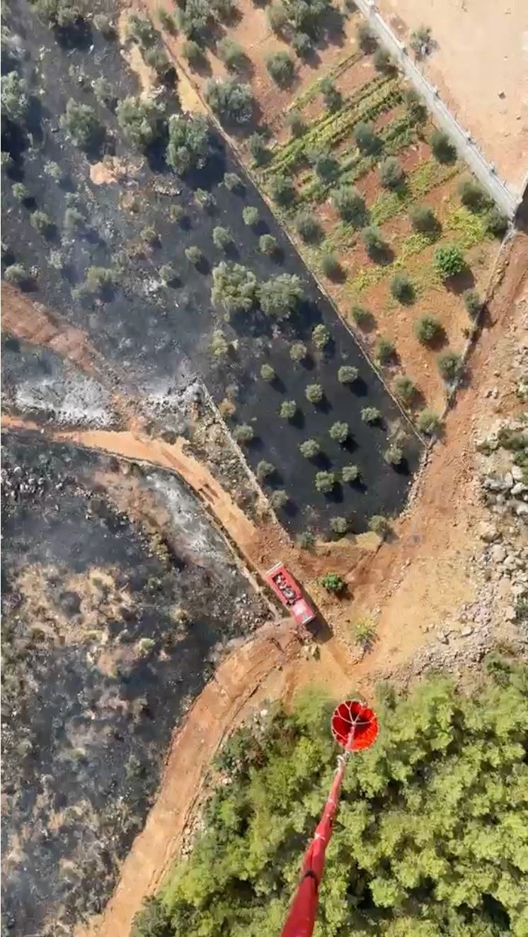 Antalya&rsquo;da ormanlık alanı tehdit eden yangın

