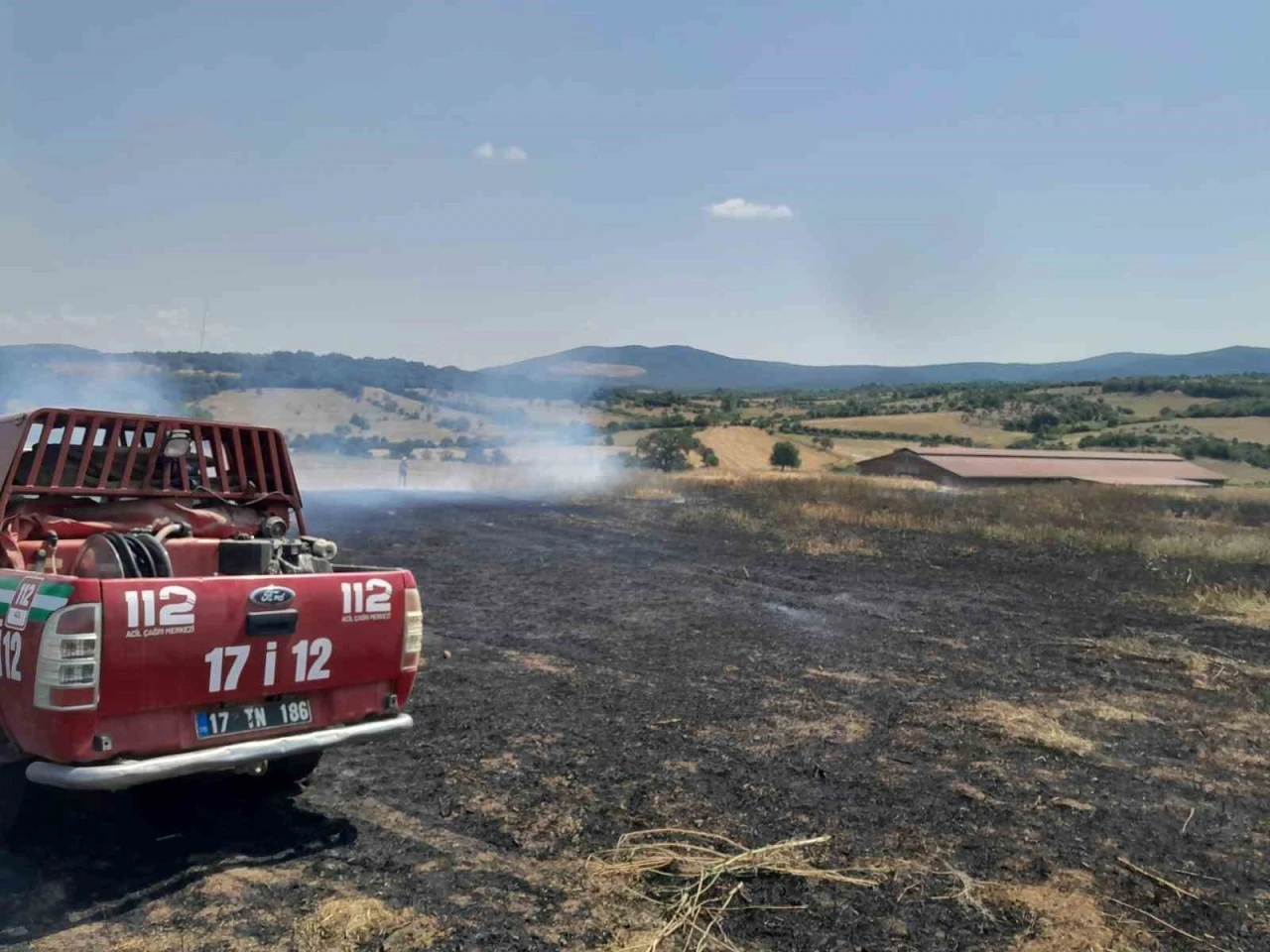 Bayramiç’te tarım arazisinde çıkan yangın kontrol altına alındı

