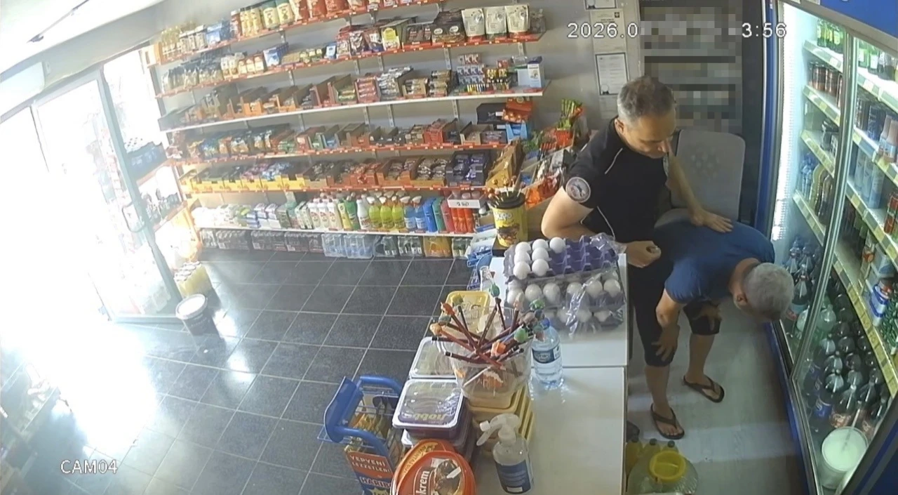 Nefes borusuna şeker ka&ccedil;an bakkalı polis memuru kurtardı
