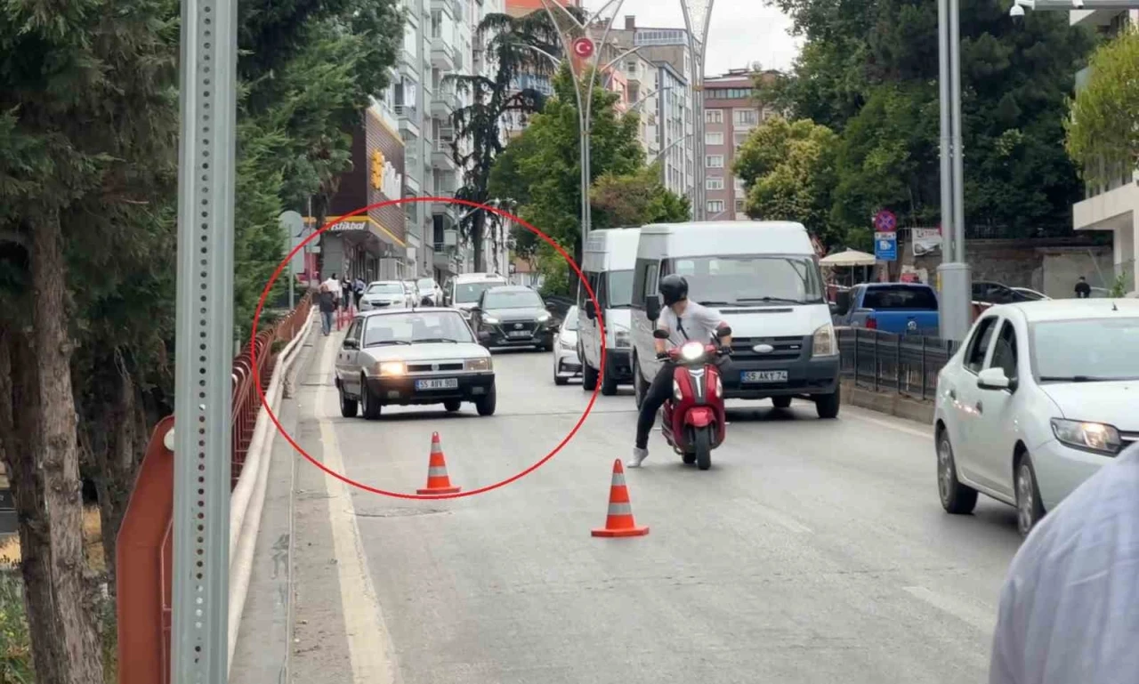 Trafik denetimini g&ouml;r&uuml;nce anayolda geri geri ka&ccedil;tı, motorize polis yakaladı
