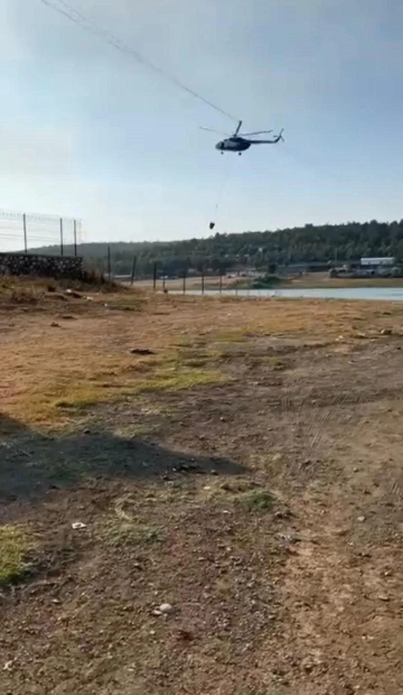Yangına müdahale eden jandarma pilotundan büyük ustalık