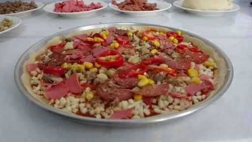 Akçadağ’ın yeni gözdesi: İnce hamurlu pizza, kömbe ve pilavı geride bıraktı
