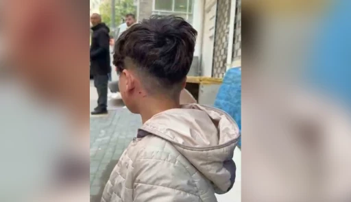 Camı tıklattığı için çocuğu darp etti