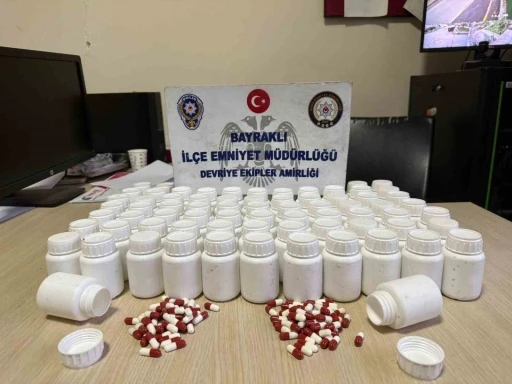 İzmir&rsquo;de mezarlıkta poşet i&ccedil;erisinden binlerce uyuşturucu hap &ccedil;ıktı

