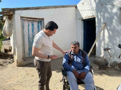 Kars MHP’den ihtiyaç sahibi aileye yardım eli
