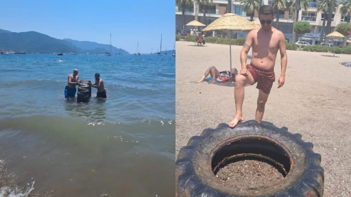 Marmaris Halk Plajı&rsquo;nda denizden &ccedil;ıkan dev lastik şaşırttı