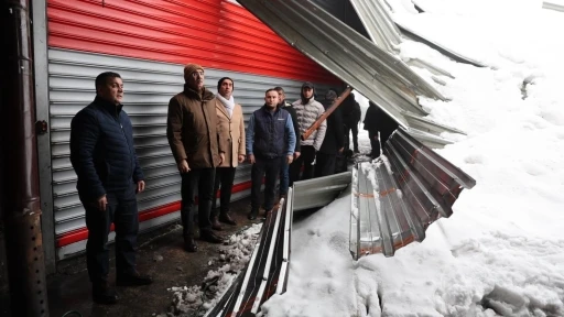 Mehmet Kuş, karda işyerleri zarar g&ouml;ren esnafla buluştu
