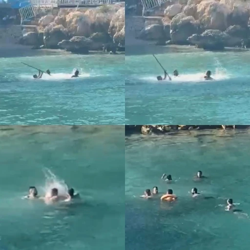Mersin&rsquo;de denizin ortasında sopalı kavga kamerada

