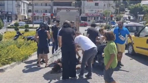 MARMARİS'TE MOTOSİKLET VE KAMYONET ÇARPIŞTI