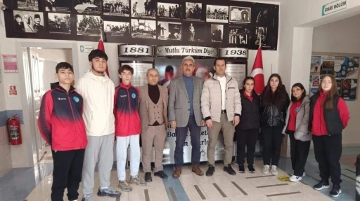Şampiyon sporculardan anlamlı ziyaret
