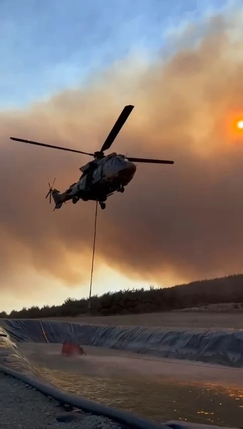 Şarköy’de zamanla yarış: Helikopterler yangınla mücadelede suyu havuzdan alıyor
