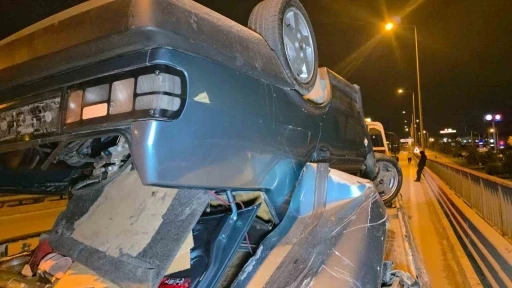 Takla atan otomobilden burunları bile kanamadan &ccedil;ıktılar
