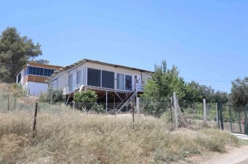 Uğruna cinayet işlenen ev kundaklandı
