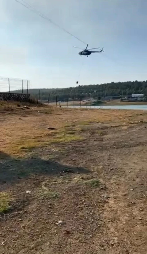 Yangına müdahale eden jandarma pilotundan büyük ustalık
