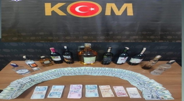 Marmariste sahte dolarla alışveriş yapan 3 şüpheliye gözaltı